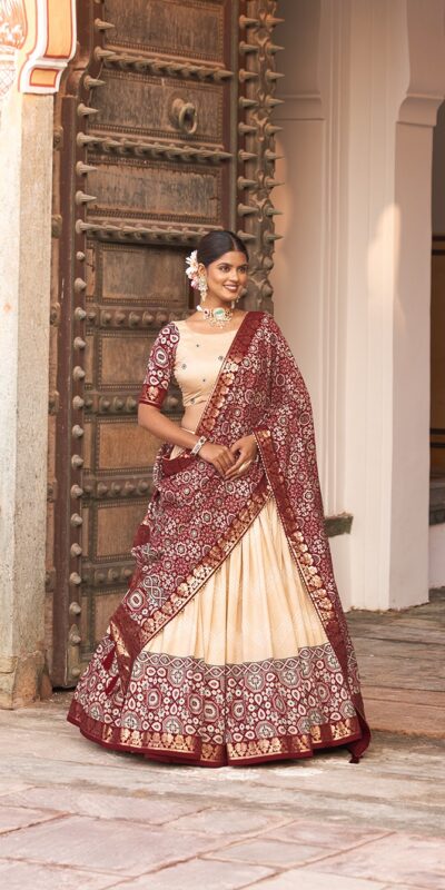 LNB 1614 Off White Color Tussar Silk Dot And Ajarakh & Drawstring With Foil Printed & Heavy Tassels Lehenga Choli   Expected Delivery 4-6 Working Days 2449/- | Lehenga, Bollywood Lehenga, Creative Lehenga, Designer Lehenga, Embroidered Lehenga, Party Wear Lehenga