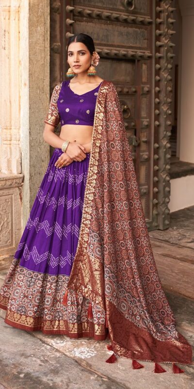 LNB 1614 Purple Color Tussar Silk Dot And Ajarakh & Drawstring With Foil Printed & Heavy Tassels Lehenga Choli   Expected Delivery 4-6 Working Days 2449/- | Lehenga, Bollywood Lehenga, Creative Lehenga, Designer Lehenga, Embroidered Lehenga, Party Wear Lehenga