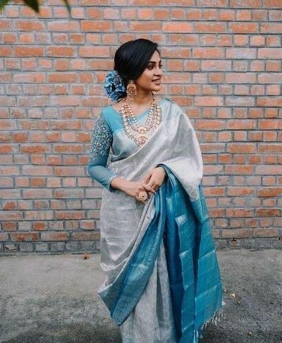 Aesthetically Pleasing Silver Color Soft Lichi Silk Butti Work Saree