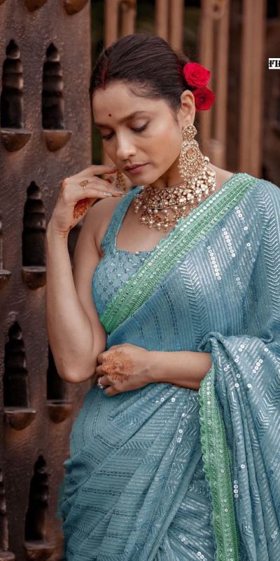 Majestic Firozi Color Georgette Beautiful Embroidery Saree