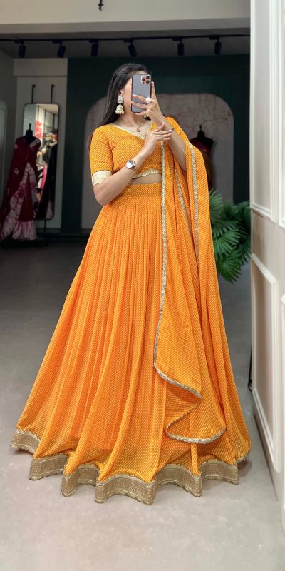 Pretty Mustard Color Georgette Print With Lace Border Lehenga Choli