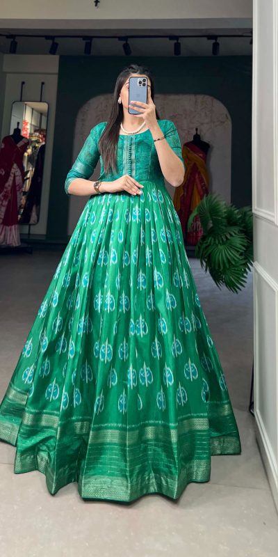 Sublime Green Color Dola Silk Printed with Zari Border Gown