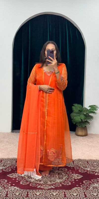 Superb Orange Color Chine Stitched Less Work Salwar Suit