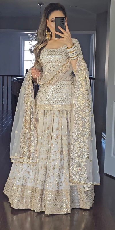 Graceful Golden Color Sequence Multi Needle Work Lehenga Choli
