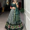 Aglow Green Color Tussar Silk Ikkat Print Foil Work Lehenga Choli
