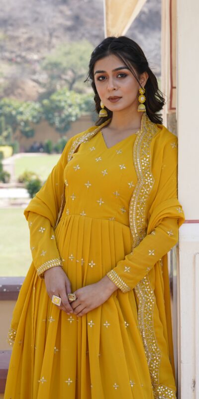 KA 1084 Yellow Faux Georgette Gown Perfect for Wedding, Party, Pooja, Festival Celebrations, Bridal Wear – . Festive Deal ₹2649. Delivery 4-6 Working | Gowns, Bollywood Gowns, Creative Gowns, Designer Gowns, Embroidered Gowns, Party Wear Gowns