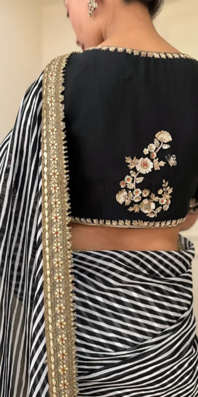 NC 5553 Black Faux Georgette Saree Perfect for Wedding, Party, Bridal Wear, Baisakhi, Raksha Bandhan –. Introductory Price ₹1899. Delivery 4-6 Workin | Designer Sarees, Sarees, Bollywood Sarees, Creative Sarees, Embroidered Sarees, Ethnic Saree, Modern Digital sarees, Party Wear Sarees