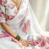 Graceful White Color Georgette Printed Pearl Lace Border Saree