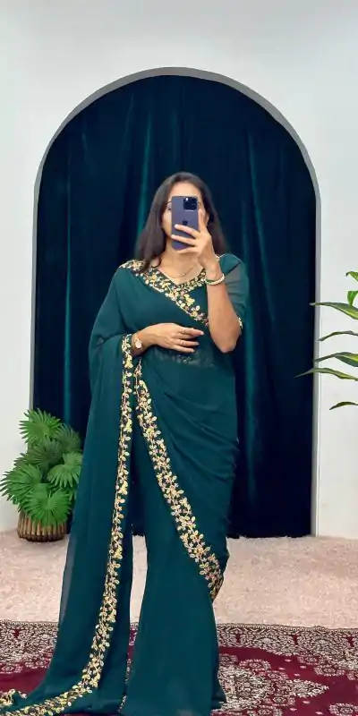  ST 1055 Peacock Blue Color Faux Georgette Embroidery Work Border Stitched Saree-Gown Wedding Party, Festive, Events Etc.4-6 Working Days@1799/- only | Gowns, Bollywood Gowns, Creative Gowns, Designer Gowns, Embroidered Gowns, Party Wear Gowns, Straight Suits