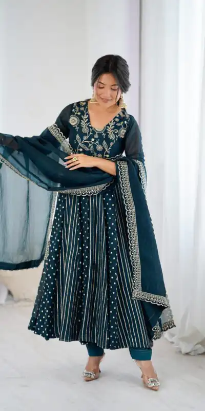 SRK 5293 Peacock Blue With Crunchy Silk With Fully Flair with Lace Work & Embroidery Work Anarkali Gown . Introductory Price ₹2149. Delivery 4-6 Worki | Gowns, Bollywood Gowns, Creative Gowns, Designer Gowns, Embroidered Gowns, Party Wear Gowns