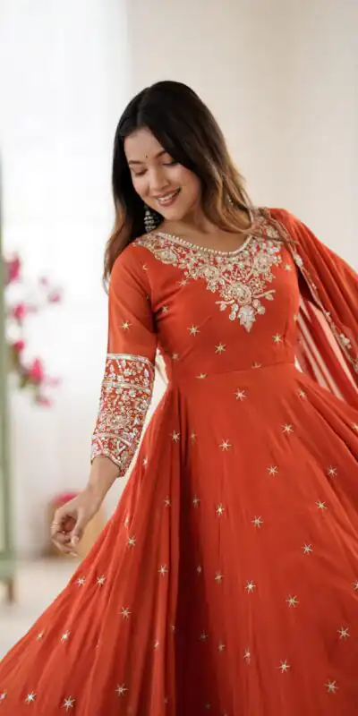 ZF 5012 Orange Blooming Faux Gown with Embroidery Work. Wedding, Party, Festive, Events Grab it for ₹2149. Delivery 4-6 Working Days. Shop now. | Lehenga, Bollywood Lehenga, Creative Lehenga, Designer Lehenga, Embroidered Lehenga, Party Wear Lehenga