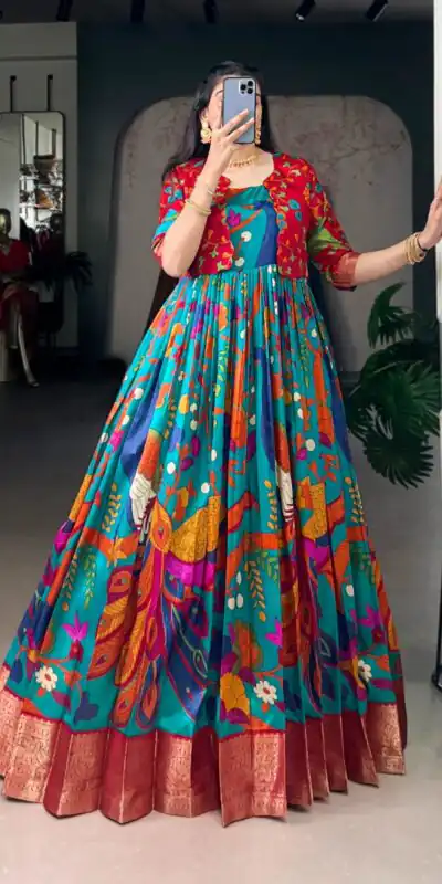 YNF 5035 Firozi in Taser Silk Zari Work & Kalamkari Print Gown . Available at ₹1799 only. Delivery 4-6 Working Days. Shop now. | Gowns, Bollywood Gowns, Creative Gowns, Designer Gowns, Embroidered Gowns, Party Wear Gowns