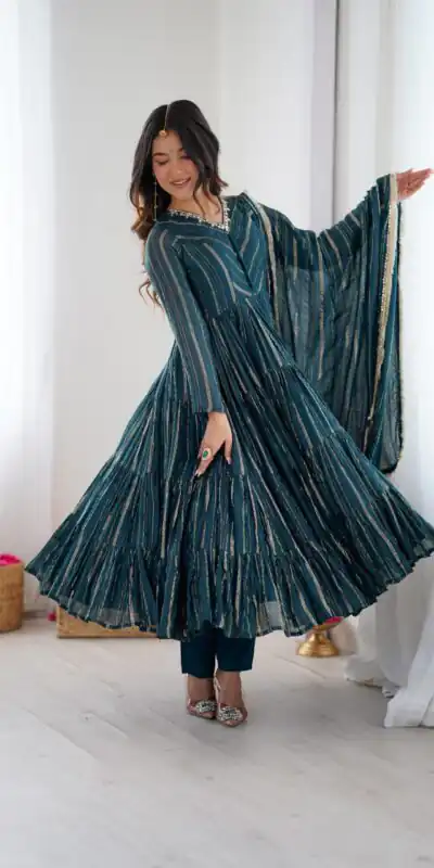 SRK 5305 Peacock Blue Color Mal Chanderi Gown with Mirror Work & Lace Work. Grab it for ₹2399. Delivery 4-6 Working Days. Shop now. | Gowns, Bollywood Gowns, Creative Gowns, Designer Gowns, Embroidered Gowns, Party Wear Gowns