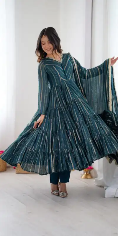 SRK 5305 Peacock Blue Color Mal Chanderi Gown with Mirror Work & Lace Work. Grab it for ₹2399. Delivery 4-6 Working Days. Shop now. | Gowns, Bollywood Gowns, Creative Gowns, Designer Gowns, Embroidered Gowns, Party Wear Gowns