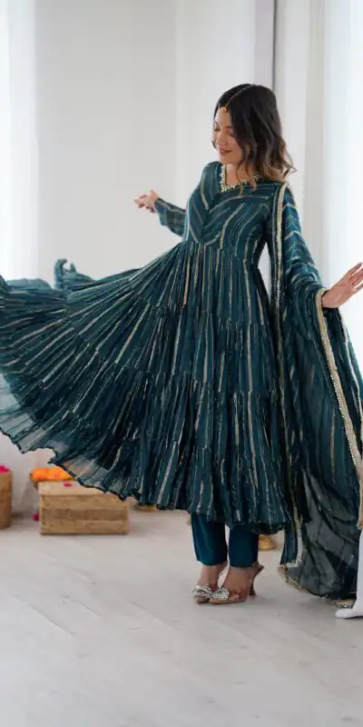 SRK 5305 Peacock Blue Color Mal Chanderi Gown with Mirror Work & Lace Work. Grab it for ₹2399. Delivery 4-6 Working Days. Shop now. | Gowns, Bollywood Gowns, Creative Gowns, Designer Gowns, Embroidered Gowns, Party Wear Gowns