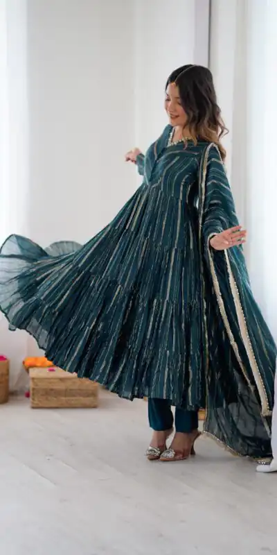 SRK 5305 Peacock Blue Color Mal Chanderi Gown with Mirror Work & Lace Work. Grab it for ₹2399. Delivery 4-6 Working Days. Shop now. | Gowns, Bollywood Gowns, Creative Gowns, Designer Gowns, Embroidered Gowns, Party Wear Gowns