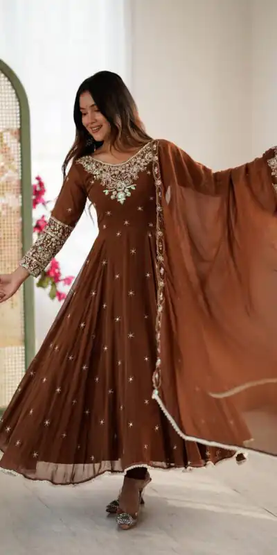 ZF 5012 Brown Blooming Faux Gown with Embroidery Work. Wedding, Party, Festive, Events Grab it for ₹2149. Delivery 4-6 Working Days. Shop now. | Lehenga, Bollywood Lehenga, Creative Lehenga, Designer Lehenga, Embroidered Lehenga, Party Wear Lehenga