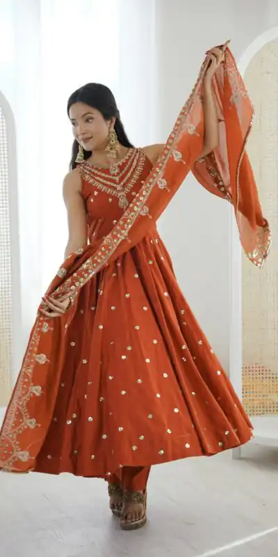 JF 038 Rust Roman Silk Gown with Embroidery Work. Wedding, Party, Festive, Events, Navratri, Exclusive Offer ₹2149. Delivery 4-6 Working Days. Shop now. | Gowns, Bollywood Gowns, Creative Gowns, Designer Gowns, Embroidered Gowns, Party Wear Gowns