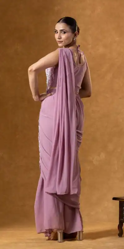 ST 1165 Onion Faux Georgette Saree with Embroidery Work & Sequins Work. Now at just ₹1799. Delivery 4-6 Working Days. Shop now. | Designer Sarees, Modern Digital sarees, Sarees, Bollywood Sarees, Creative Sarees, Embroidered Sarees, Ethnic Saree, Party Wear Sarees