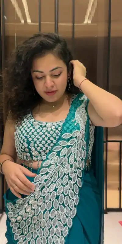 ST 1165 Teal Faux Georgette Saree with Embroidery Work & Sequins Work. Now at just ₹1799. Delivery 4-6 Working Days. Shop now. | Designer Sarees, Sarees, Bollywood Sarees, Creative Sarees, Embroidered Sarees, Ethnic Saree, Modern Digital sarees, Party Wear Sarees