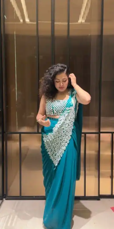 ST 1165 Teal Faux Georgette Saree with Embroidery Work & Sequins Work. Now at just âš1799. Delivery 4-6 Working Days. Shop now. | Designer Sarees, Sarees, Bollywood Sarees, Creative Sarees, Embroidered Sarees, Ethnic Saree, Modern Digital sarees, Party Wear Sarees