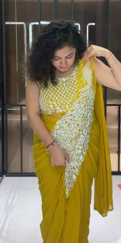 ST 1165 Yellow Faux Georgette Saree with Embroidery Work & Sequins Work. Now at just ₹1799. Delivery 4-6 Working Days. Shop now. | Designer Sarees, Sarees, Bollywood Sarees, Creative Sarees, Embroidered Sarees, Ethnic Saree, Modern Digital sarees, Party Wear Sarees