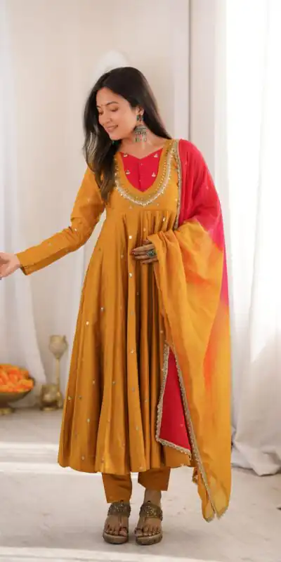 ZF 5023 Mustered Roman Silk Gown with Mirror Work & Embroidery Work. Special Price ₹2099. Delivery 4-6 Working Days. Shop now. | Gowns, Bollywood Gowns, Creative Gowns, Designer Gowns, Embroidered Gowns, Party Wear Gowns