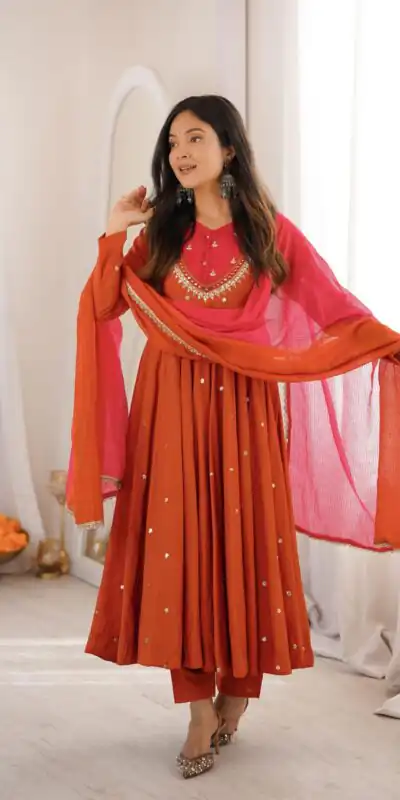 ZF 5023 Rust Roman Silk Gown with Mirror Work & Embroidery Work. Special Price ₹2099. Delivery 4-6 Working Days. Shop now. | Gowns, Bollywood Gowns, Creative Gowns, Designer Gowns, Embroidered Gowns, Party Wear Gowns