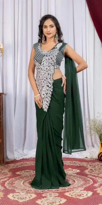 ST 1165 Green Faux Georgette Saree with Embroidery Work & Sequins Work. Now at just ₹1799. Delivery 4-6 Working Days. Shop now. | Designer Sarees, Modern Digital sarees, Sarees, Bollywood Sarees, Creative Sarees, Embroidered Sarees, Ethnic Saree, Party Wear Sarees