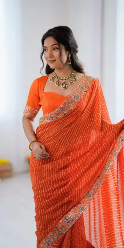 SP 79 Orange Faux Georgette Saree Perfect for Wedding, Party, Lohri, Engagement, Baby Shower – . Now at just ₹1999. Delivery 4-6 Working Days. Shop now | Designer Sarees, Modern Digital sarees, Sarees, Bollywood Sarees, Creative Sarees, Embroidered Sarees, Ethnic Saree, Party Wear Sarees