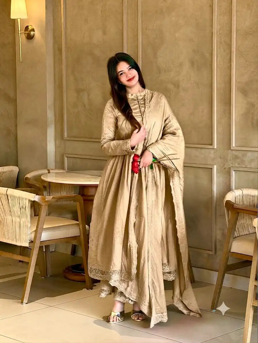 Fancy Chiku Roman Silk Embroidery Cut Work Gown