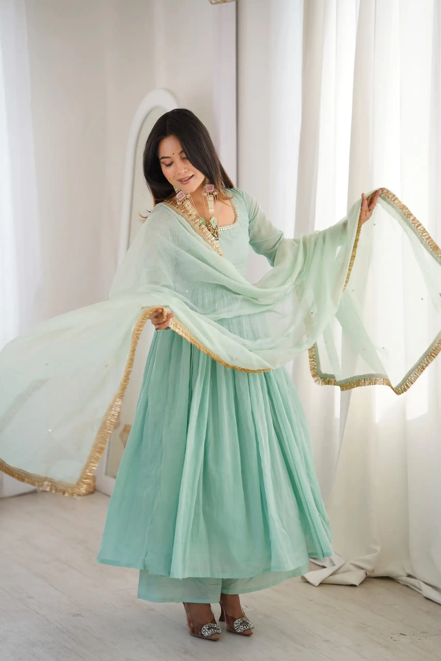 Nice Sea Green Heavy Faux Lace Border Work Gown