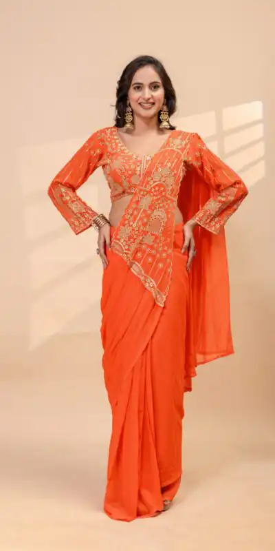 ST 1172 Orange Faux Georgette Saree with Embroidery Work & Bead Work. Now at just ₹1849. Delivery 4-6 Working Days. Shop now. | Designer Sarees, Modern Digital sarees, Sarees, Bollywood Sarees, Creative Sarees, Embroidered Sarees, Ethnic Saree, Party Wear Sarees