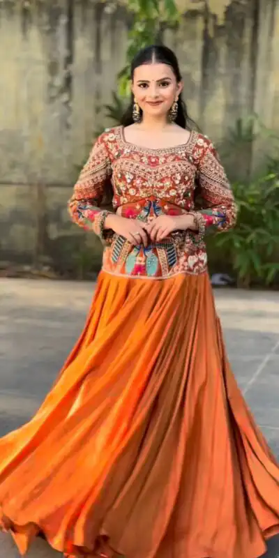 PC 579 Orange Chinon silk Lehenga Choli with Sequins Work & Embroidery Work. Now at just ₹2749. Delivery 4-6 Working Days. Shop now. | Lehenga, Bollywood Lehenga, Creative Lehenga, Designer Lehenga, Embroidered Lehenga, Party Wear Lehenga