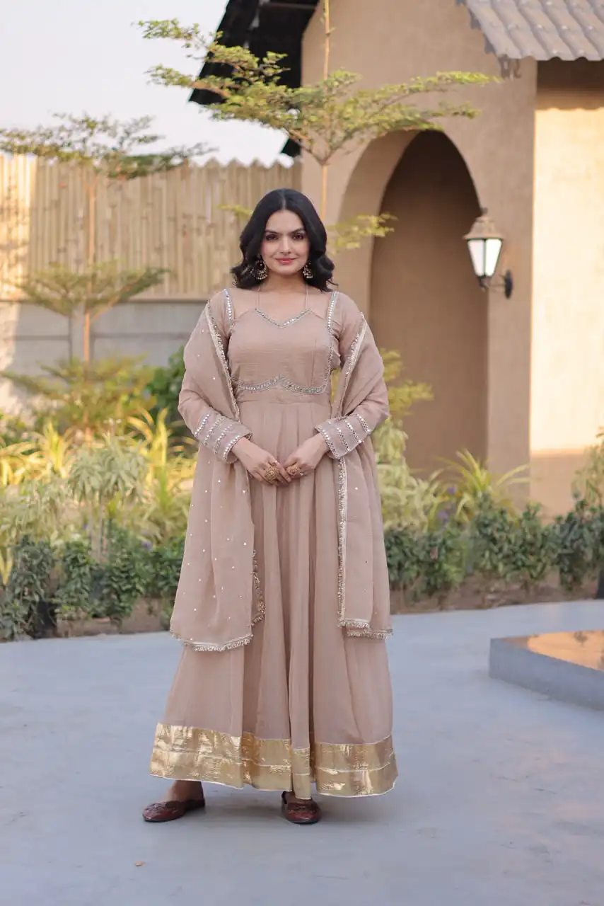 Pretty Cream Silver Crunchy Mirror Lace Work Gown