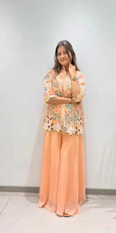 Stylist Peach Georgette Sequins Work Salwar Suit