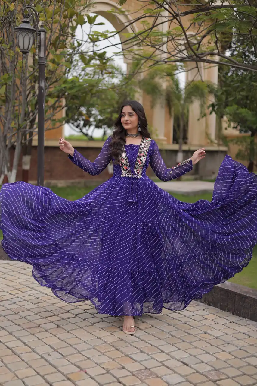 Shiny Purple Faux Georgette Laheriya Print Work Gown
