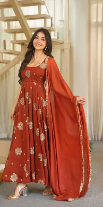 ZSR 3189 Rust Doremon Crush Gown with Lace Work & Mirror Work. Exclusive Offer ₹2399. Delivery 4-6 Working Days. Shop now. | Gowns, Bollywood Gowns, Creative Gowns, Designer Gowns, Embroidered Gowns, Party Wear Gowns