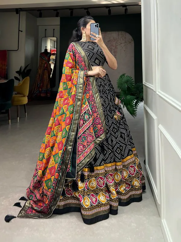 Angelic Black Color Tussar Silk With Heavy Tassels patola printed  Lehenga Choli
