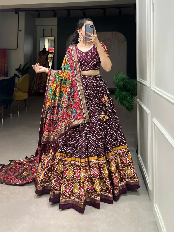 Angelic Wine Color Tussar Silk With Heavy Tassels patola printed  Lehenga Choli