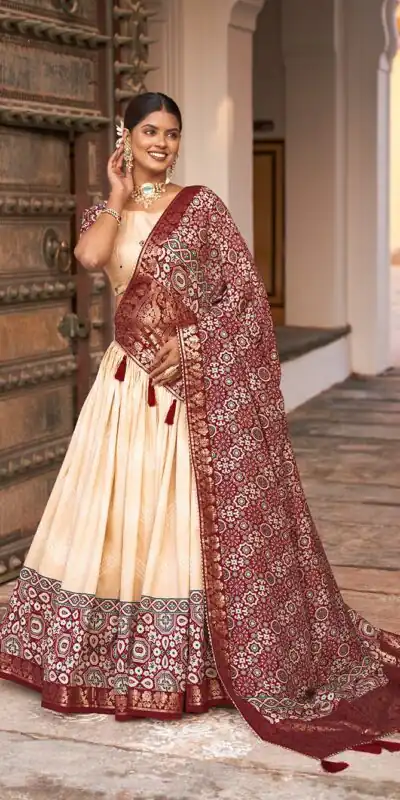 LNB 1614 Off White Color Tussar Silk Dot And Ajarakh & Drawstring With Foil Printed & Heavy Tassels Lehenga Choli Expected Delivery 4-6 Working Days 2449/- | Lehenga, Bollywood Lehenga, Creative Lehenga, Designer Lehenga, Embroidered Lehenga, Party Wear Lehenga