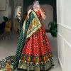 Glamorous Red Color Tussar Silk Drawstring & Printed With Foil Print & Heavy Tassels Lehenga Choli