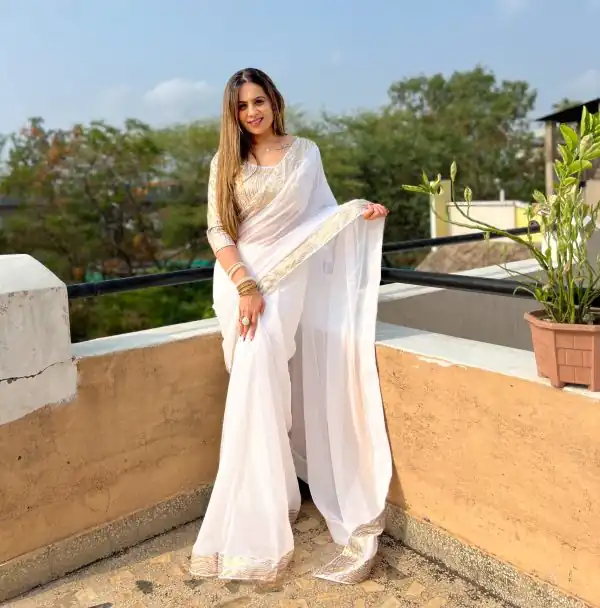 Glamorous White Color Georgette Heavy Sequence Work Saree