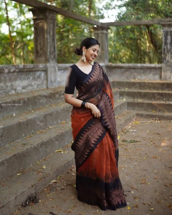 Mesmerizing Orange Color Soft Lilan Slab Weaving Work Saree