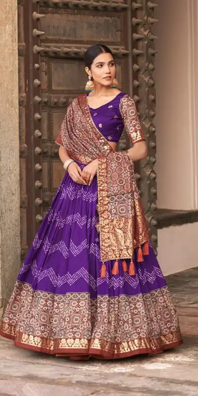 LNB 1614 Purple Color Tussar Silk Dot And Ajarakh & Drawstring With Foil Printed & Heavy Tassels Lehenga Choli Expected Delivery 4-6 Working Days 2449/- | Lehenga, Bollywood Lehenga, Creative Lehenga, Designer Lehenga, Embroidered Lehenga, Party Wear Lehenga