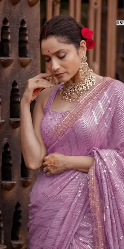 Majestic Onion Color Georgette Beautiful Embroidery Saree