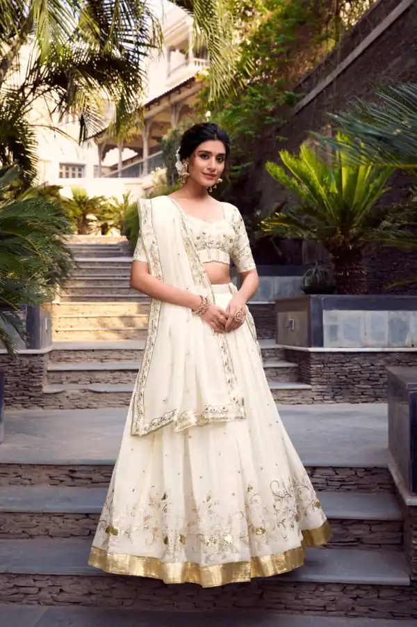 Off White Silver Glosy Sequins Lehenga Choli